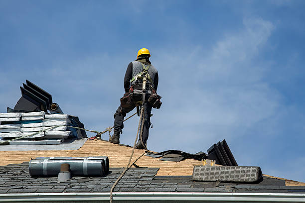 Professional Roof Replacement technician working in Spencer, MA